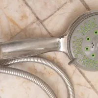 شلنگ با سریه دوش حمام چند  کاره