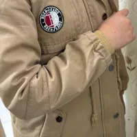 کاپشن فوق العاده‌گرم در حد‌نو