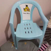 صندلی و عروسک