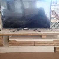 تلویزیون سامسونگ ۴۹ اینچ led با میز تلویزیون