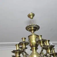 لوستر و اینه و شمعدان برنج