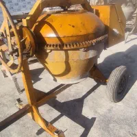 بتونیر میکسر بتن گیر بالابر قیچی اره آتشی.همدان