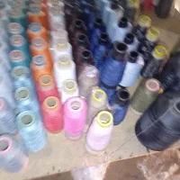 نخ سردوز و قیچی خیاطی