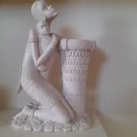 مجسمه و جا شمعی