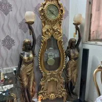 ساعت ایستاده وجفت مجسمه