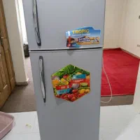 یک عدد یخچال فریزر 12فوت لوکسور ویک عدد اجاق گاز