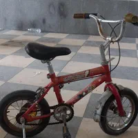 ** دوچرخه سایز ۱۲ با کمکی  **