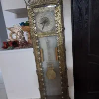 ساعت و ویترین  و آینه شمعدان