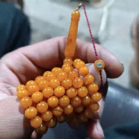 تسبیح کهربا  همراه مهر نقره دار