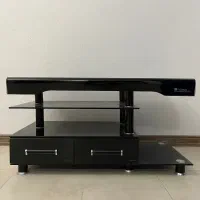 میز تلویزیون شیشه‌ایی