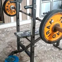 دستگاه بدنسازی چند‌کاره به همراه صفخه و هالتر