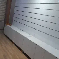 استند دیواری همراه با کمد های پایین