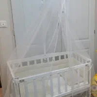 تخت کنار مادر