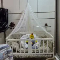 تخت و گهواره نوزاد و کودک
