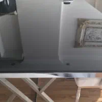 ست میز ناهارخوری شیشه‌ای با ۶ صندلی پایه استیل