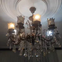لوستر ۱۰ شاخه برنز با کریستال شامپاینی در حد نو