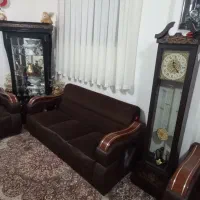 یک دست مبل نه نفرویک ساعت ویک بوفه