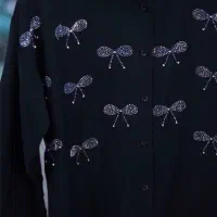 مانتو مشکی|لباس|قم, وادی السلام|دیوار
