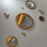 اینه دکوراتیو همراه با پروانه
