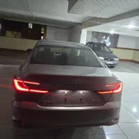 تویوتا کمری پریمیوم هیبرید چین تیتانیوم۲۰۲۵صفر خشک