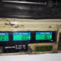 ترازو دیجیتال و سنگی قدیمی در شهریار