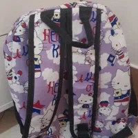 کیف مدرسه|کیف، کفش، کمربند|رباط‌کریم, رباط‌کریم|دیوار