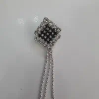 سنجاق سینه.  سگک جفتی دوختنی