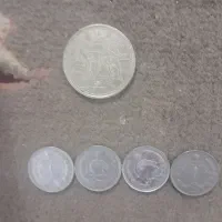 سکه کلکسیونی ۵۰۰ ینی ژاپن و۴عدد۱ریالی شیرخورشید