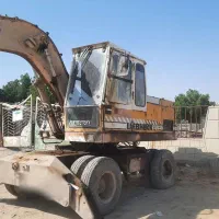 بیل مکانیکی لاستیکی۹۱۲ اجاره و فروش