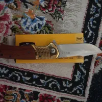 چاقو باک طلایی