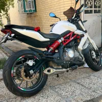 بنلی|موتورسیکلت|شیراز, میرزاکوچک خان|دیوار