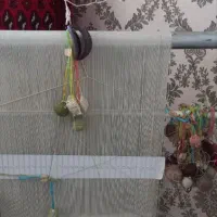 دار قالی با نخ و نقشه