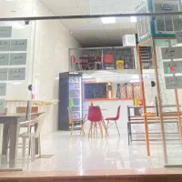 تابلو ال ای دی و میز و صندلی