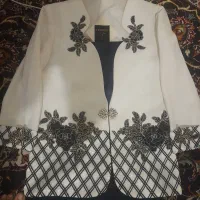 کت دامن|لباس|مشهد, هفت تیر (نه دره)|دیوار