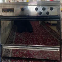 اجاق گازفردارهمراه بادوجوجه گردان فر وگرم کن پیلوت