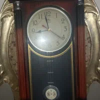 ساعت دیواری پاندولی طرح کلاسیک سالم و شیک