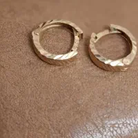 یک جفت گوشواره بچه گانه ۳ درصد بالای تابلو