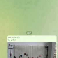 دار قالی با تمام نخها ونقشه.و قسمتی هم بافته شد