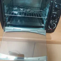 یه عدد توستر به همراه پرده ویه مقدار وسایل کودک