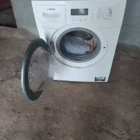 ماشین لباس شویی..