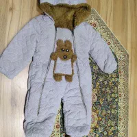 کاپشن سرهمی نوزادی خیلی ضخیم