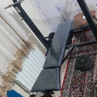 دستگاه بدنسازی هفت کاره با هالتر و دمبل