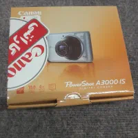 دوربین عکاسی به همراه پایه دوربین