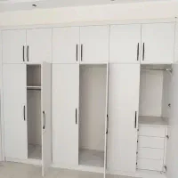 ساخت و طراحی کابینت و کمد دیواری MDF