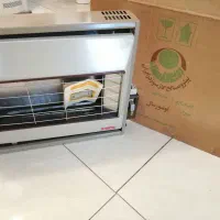 بخاری اونیورسال قدیمی|بخاری، هیتر، شومینه|زرقان, |دیوار