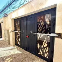 تعمیر جک در پارکینگ درب ریموتی اتوماتیک برقی