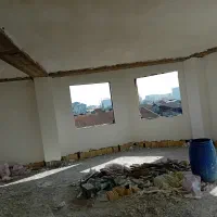 کار گر .گچکاری ساختمان