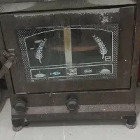 تنور پخت نان و کیک مرغ