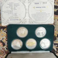 سکه۹۹۹۹به همراه یک عدد روکش طلا