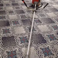 کار با دستگاه علف زن